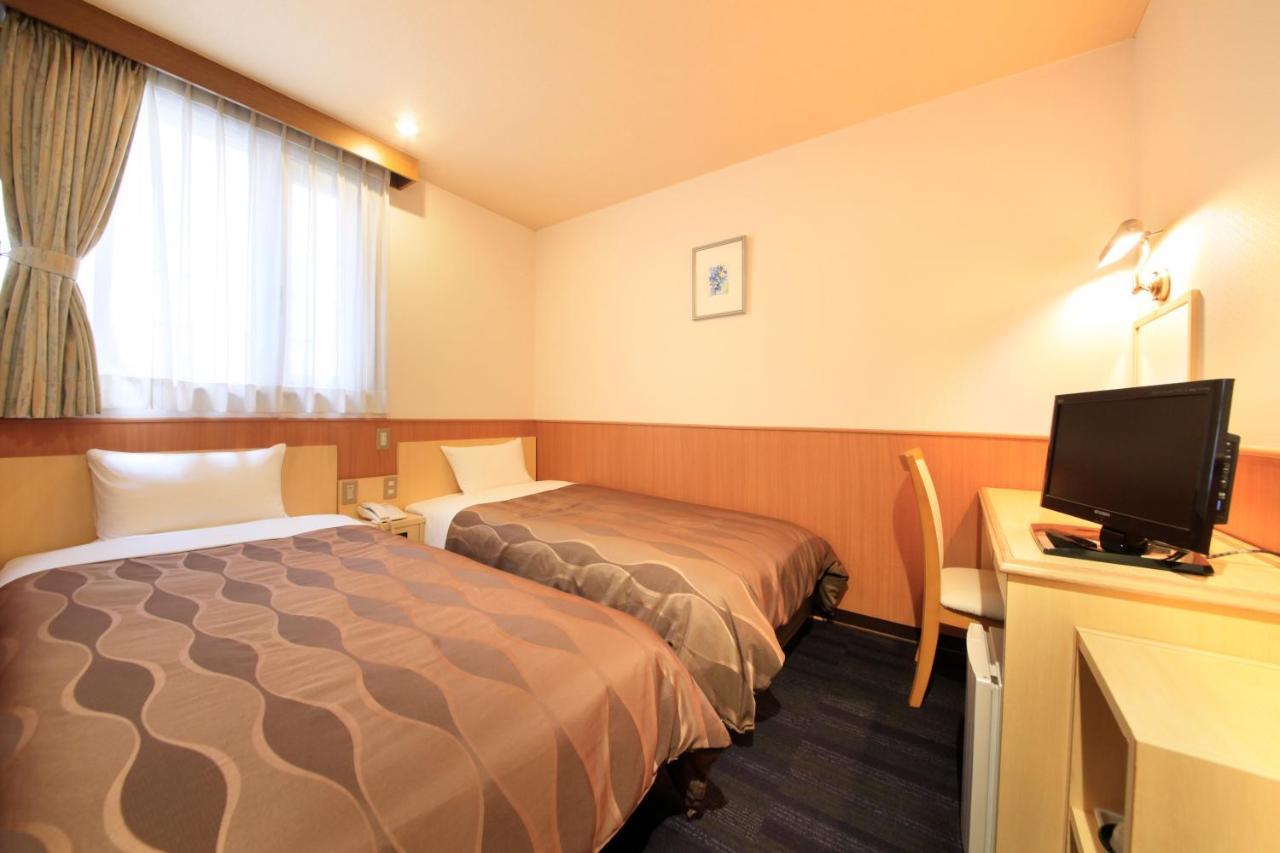 Sendai Business Hotel Esterno foto